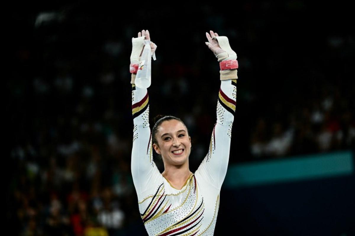Belgium's Nina Derwael competes in the artistic gymnastics women's uneven bars final during the Paris 2024 Olympic Games at the Bercy Arena in Paris, on August 4, 2024.  Loic VENANCE / AFP