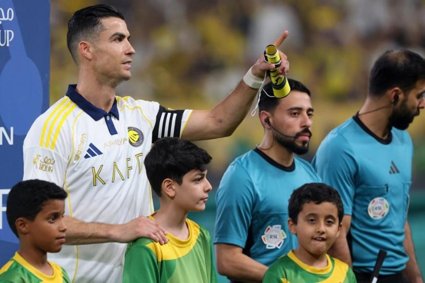 Nassr's Portuguese forward #07 Cristiano Ronaldo gestures to spectators before the start of the Saudi Pro League football match between Al-Nassr and Damac at the Al-Awwal Park Stadium in Riyadh on May 21, 2026.  Fayez NURELDINE / AFP