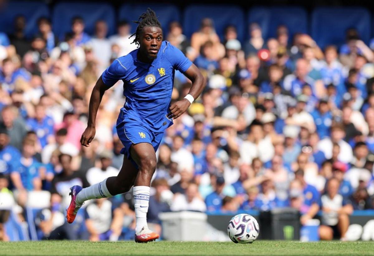 Chelsea's Belgian midfielder #45 Romeo Lavia runs with the ball during the pre-season friendly football match between Chelsea and Real Sociedad at Stamford Bridge in London on August 15, 2026.  Adrian DENNIS / AFP