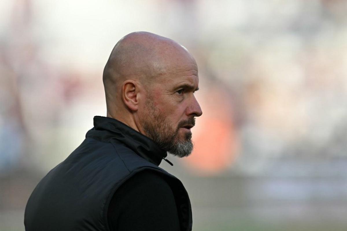 Manchester United's Dutch manager Erik ten Hag checks out the conditions ahead of the English Premier League football match between West Ham United and Manchester United at the London Stadium, in London on October 27, 2024.  Glyn KIRK / AFP
