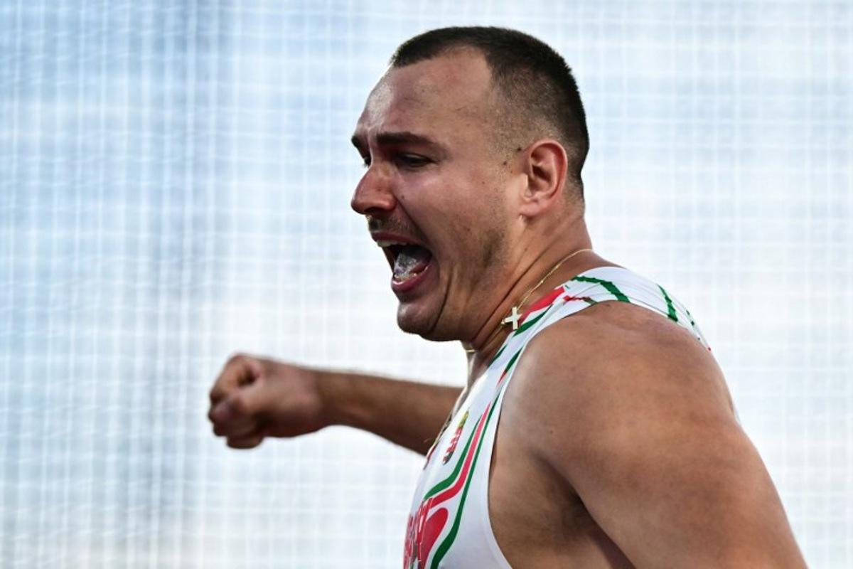 Hungary's Bence Halasz reacts as he competes in the men's hammer throw final during the European Athletics Championships at Alexander Stadium in Birmingham on August 11, 2026.  Ben STANSALL / AFP