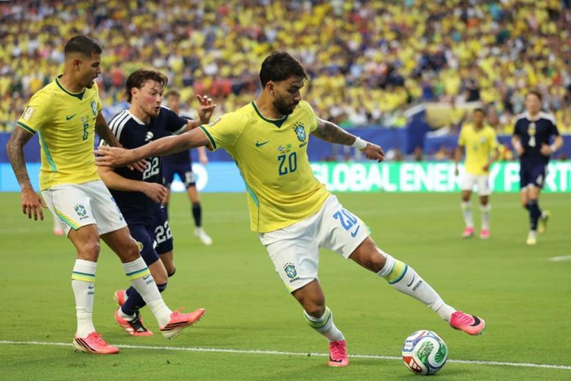 Brazil's midfielder #20 Lucas Paqueta kicks the ball during the 2026 World Cup Group C football match between Scotland and Brazil at the Miami Stadium in Miami Gardens on June 24, 2026.   PATRICIA DE MELO MOREIRA / AFP