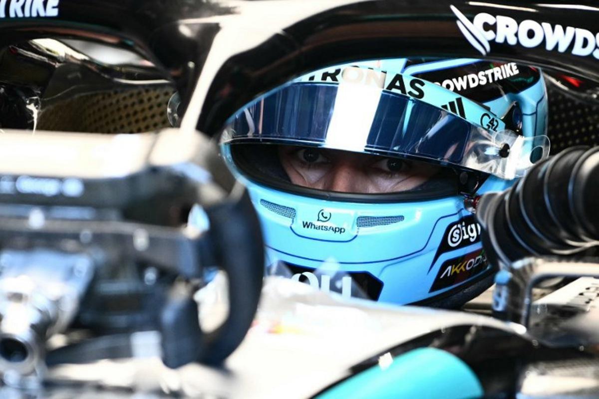 Mercedes' British driver George Russell gets in his car prior to the qualifying session at the Red Bull Ring race track in Spielberg, Austria on June 27, 2026, ahead of the Formula One Austrian Grand Prix.  Joe Klamar / AFP