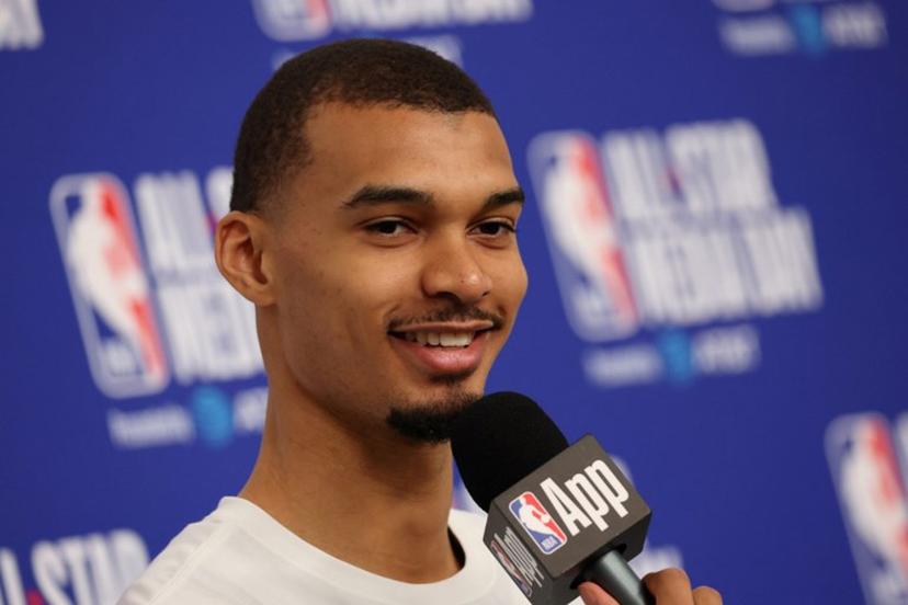 French basketball player Victor Wembanyama of the San Antonio Spurs speaks to the media during the NBA All-Star media day at the Intuit Dome in Inglewood, California, on February 14, 2026.  Patrick T. Fallon / AFP