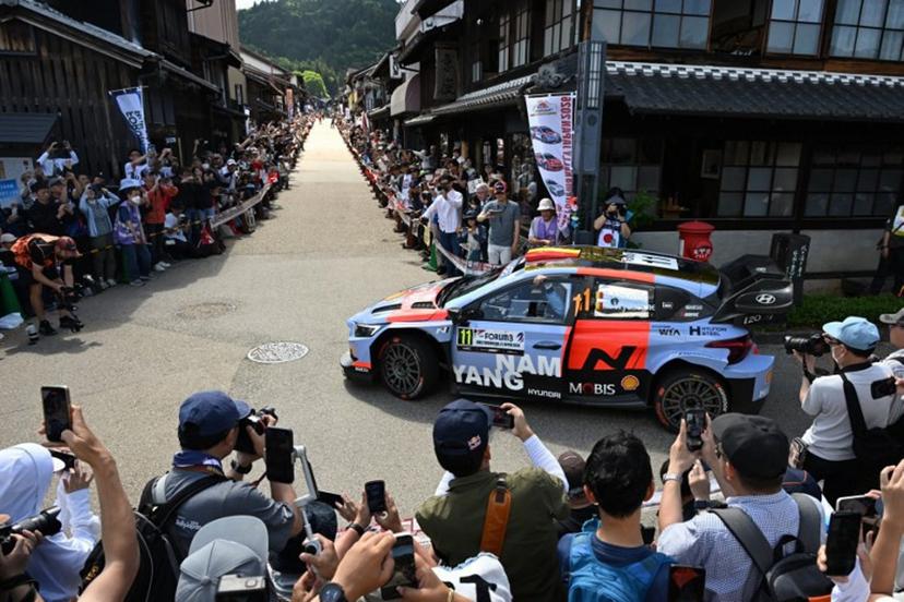 Thierry Neuville of Belgium and his co-driver Martijn Wydaeghe of Belgium drive their Hyundai i20 N Rally1 on the traditional Japanese townscape of Iwamura during the Rally Japan, the 7th round of the FIA World Rally Championships in Ena city, Gifu prefecture on May 30, 2026.   Toshifumi KITAMURA / AFP