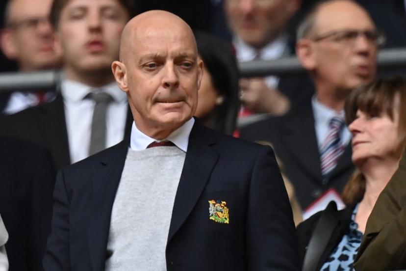 Dave Brailsford takes his seat for the English FA Cup semi-final football match between Coventry City and Manchester United at Wembley Stadium in north west London on April 21, 2024.   Glyn KIRK / AFP