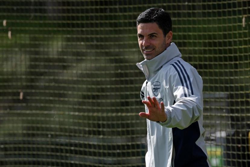 Arsenal's Spanish manager Mikel Arteta arrives to take a team training session at London Colney, north of London, on April 14, 2026, on the eve of their UEFA Champions League, quarter-final, second-leg football match against Sporting Lisbon.  Adrian Dennis / AFP