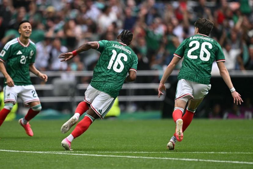 Mexico's forward #16 Julian Quinones celebrates scoring his team's first goal next to teammate midfielder #26 Brian Gutierrez during the 2026 World Cup Group A football match between Mexico and South Africa at the Mexico City Stadium in Mexico City on June 11, 2026.  Yuri CORTEZ / AFP