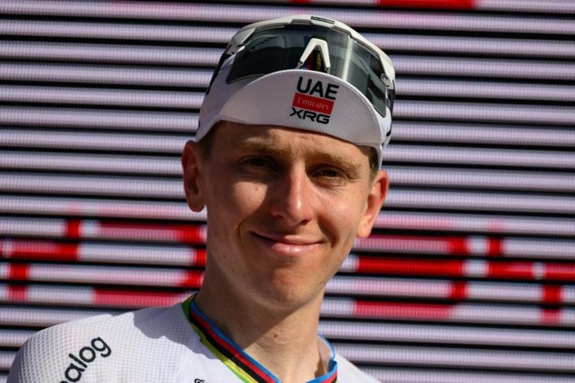 UAE Team Emirates - XRG team's Slovenian rider Tadej Pogacar celebrates on the podium after winning the fifth and final stage of the Men's Tour of Switzerland (Tour de Suisse) cycling race, 150.7 km starting and finishing in Villars-sur-Ollon on June 21, 2026.  Harold Cunningham / AFP