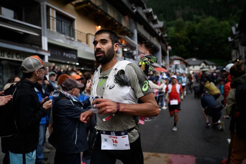 US trailer Ben Dhiman competes in the 22nd edition of the Ultra Trail du Mont Blanc (UTMB), a 174km trail race crossing France, Italy and Switzerland, in Chamonix, south-eastern France on August 29, 2025.   JEFF PACHOUD / AFP