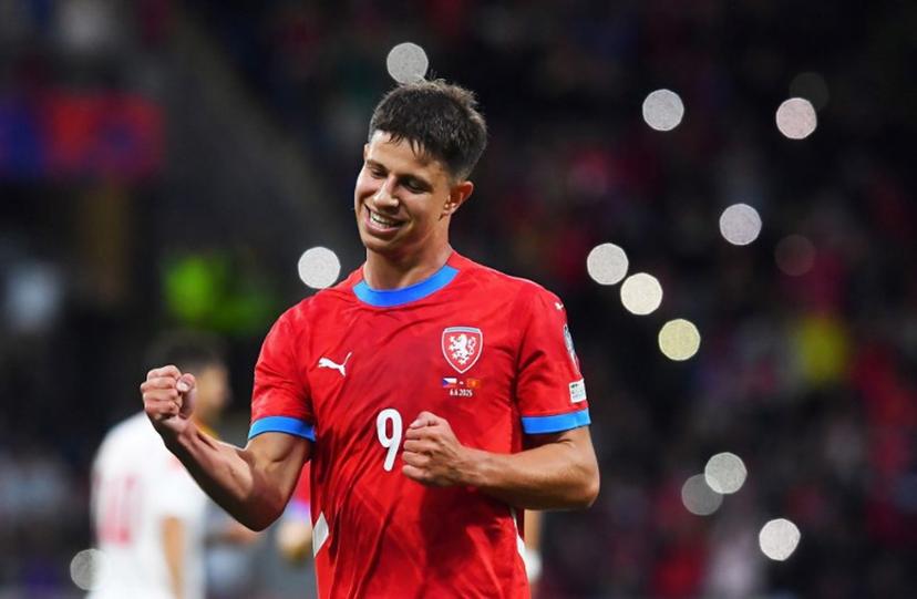 Czech Republic's forward #09 Adam Hlozek celebrates scoring the opening goal during the 2026 FIFA World Cup Qualifying Group L football match between between Czech Republic and Montenegro in Plzen on June 6, 2025.  Michal Cizek / AFP