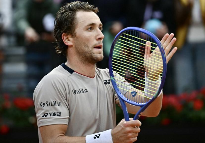 Norway's Casper Ruud celebrates after winning against Russia's Karen Khachanov during the ATP Rome Open tennis tournament at Foro Italico in Rome on May 13, 2026.   Filippo MONTEFORTE / AFP