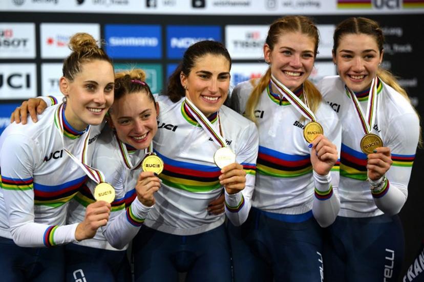 (From L) Italy's Vittoria Guazzini, Italy's Elisa Balsamo, Italy's Chiara Consonni, Italy's Martina Alzini and Italy's Martina Fidanza celebrate with their gold medals on the podium after winning the Women's Team Pursuit finals during the UCI Track Cycling World Championships at the Velodrome of Saint-Quentin-en-Yvelines, southwest of Paris, on October 13, 2022.  Anne-Christine POUJOULAT / AFP