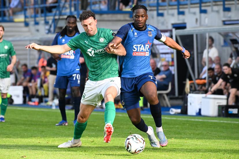Lommel's Dries Wouters and Dender's Bruny Nsimba pictured in action during a soccer game between FCV Dender EH and Lommel SK, Saturday 23 May 2026 in Denderleeuw, the return leg of the Final of the Promotion Play-Offs of the 2025-2026 'Challenger Pro League' 1B second division of the Belgian championship. Lommel won the first leg 3-2. BELGA PHOTO JILL DELSAUX