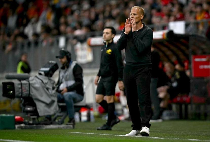 Reims' Belgian coach Karel Geraerts reacts in the techinal area during the French L2 football match between Le Mans FC and Stade de Reims at the Stade Marie-Marvingt in Le Mans on May 2, 2026.  Lou BENOIST / AFP