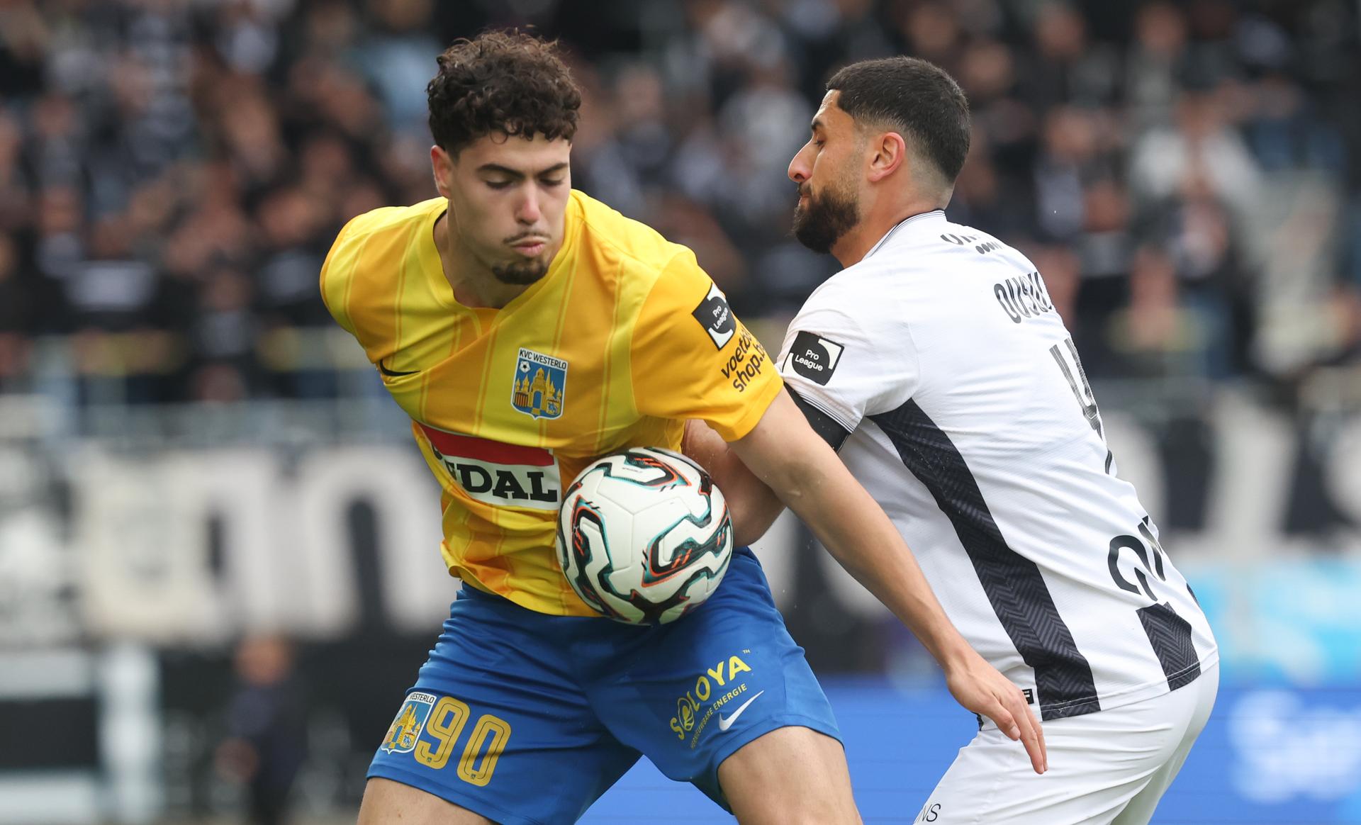 Westerlo's Nacho Ferri and Charleroi's Aiham Ousou fight for the ball during a soccer match between Sporting Charleroi and KVC Westerlo, Saturday 16 May 2026 in Charleroi, on the eight day of the Europe Play-offs (PO2) of the 2025-2026 'Jupiler Pro League' first division of the Belgian championship. BELGA PHOTO VIRGINIE LEFOUR
