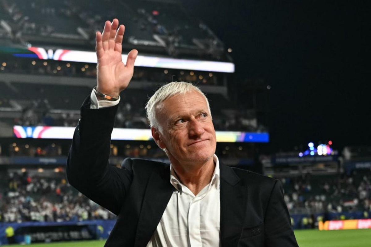 France's head coach Didier Deschamps waves to fans after winning the 2026 World Cup Group I football match between France and Iraq at the Philadelphia Stadium in Philadelphia on June 22, 2026.   MAURO PIMENTEL / AFP