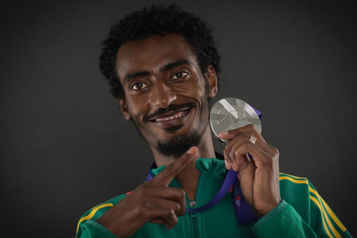 Silver medallist of the men's 10000m final Ethiopia's Yomif Kejelcha poses for portraits during a studio photo session on the sidelines of the World Athletics Championships in Tokyo on September 15, 2025.  Andrej ISAKOVIC / AFP