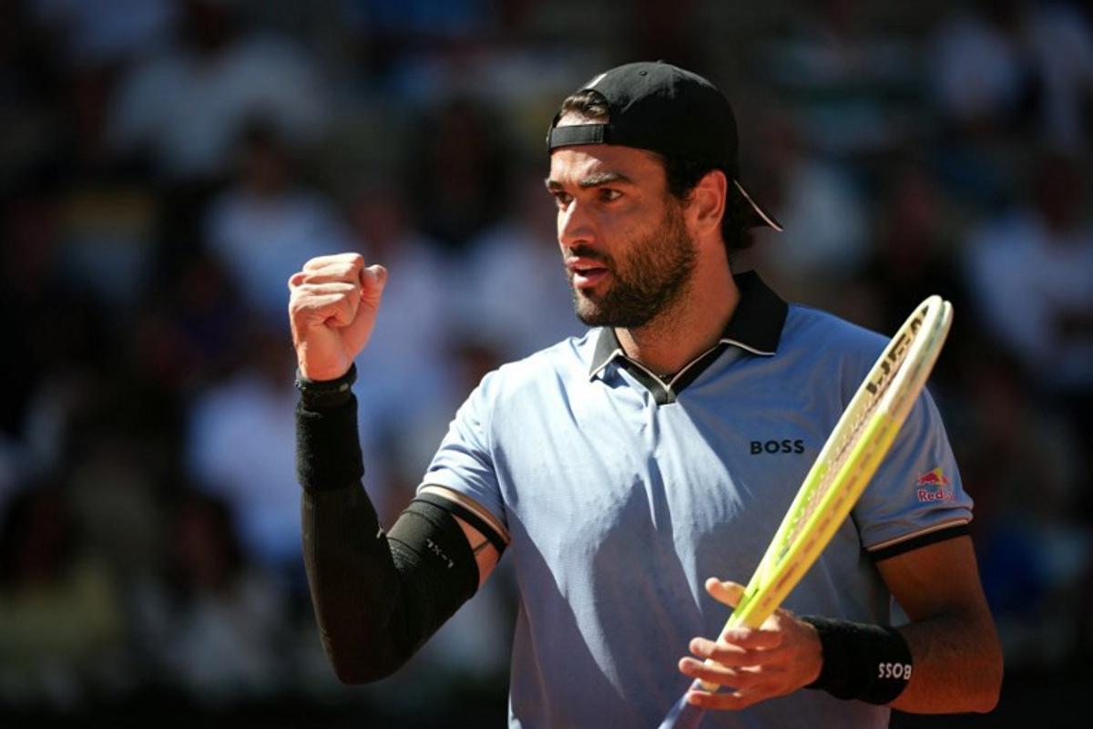 Italy's Matteo Berrettini reacts to a point against Argentina's Juan Manuel Cerundolo during their men's singles match on day 9 of the French Open tennis tournament on Court Suzanne-Lenglen at the Roland-Garros Complex in Paris on June 1, 2026.  Dimitar DILKOFF / AFP