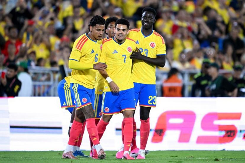 Colombia's forward #07 Luis Diaz celebrates with teammates midfielder #06 Richard Rios and defender #23 Davinson Sanchez after scoring their team's second goal during the international friendly football match between Colombia and Costa Rica at the Nemesio Camacho El Campin stadium in Bogota on June 1, 2026.  Raul ARBOLEDA / AFP