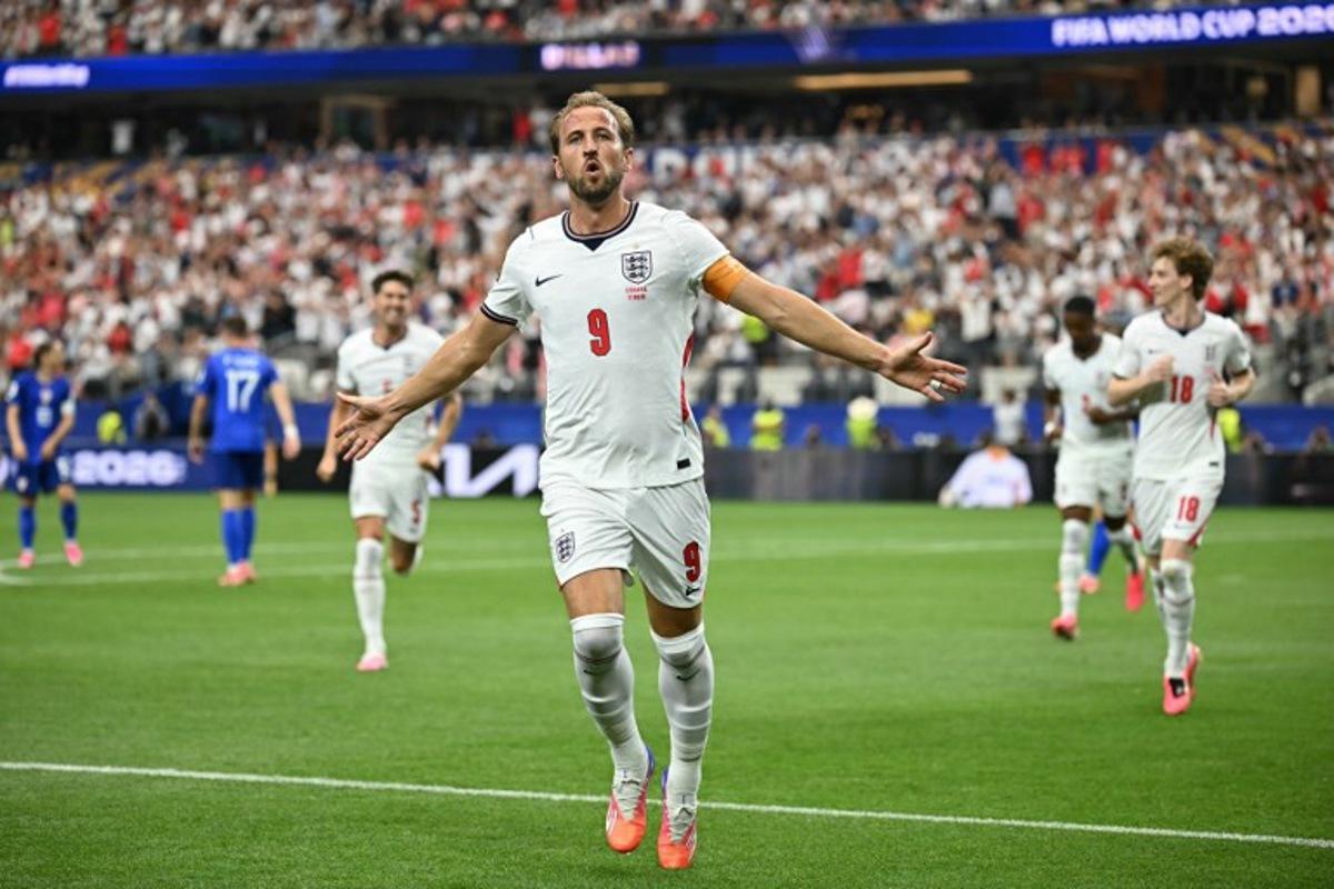 England's forward #09 Harry Kane  celebrates after scoring his team's second goal during the 2026 World Cup Group L football match between England and Croatia at the Dallas Stadium in Arlington on June 17, 2026.   Paul ELLIS / AFP
