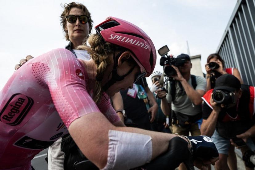 SD Worx Dutch rider Anna Van Der Breggen, wearing the overall leader's pink jersey (Maglia Rosa), reacts after she crossed the finish line after the 9th stage of the Giro Italia Women 2026 - Tour of Italy Women cycling race between Saluzzo and Saluzzo, and place third overall on June 7, 2026.   MARCO BERTORELLO / AFP