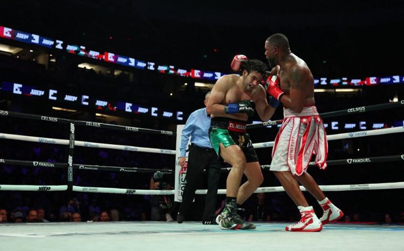 Cuban boxer Yuniel Dorticos (R) faces off against Mexican boxer Gilberto Ramírez during their WBA/WBO unified cruiserweight championship bout at the Honda Center in Anaheim, California, on June 28, 2025.  Patrick T. Fallon / AFP