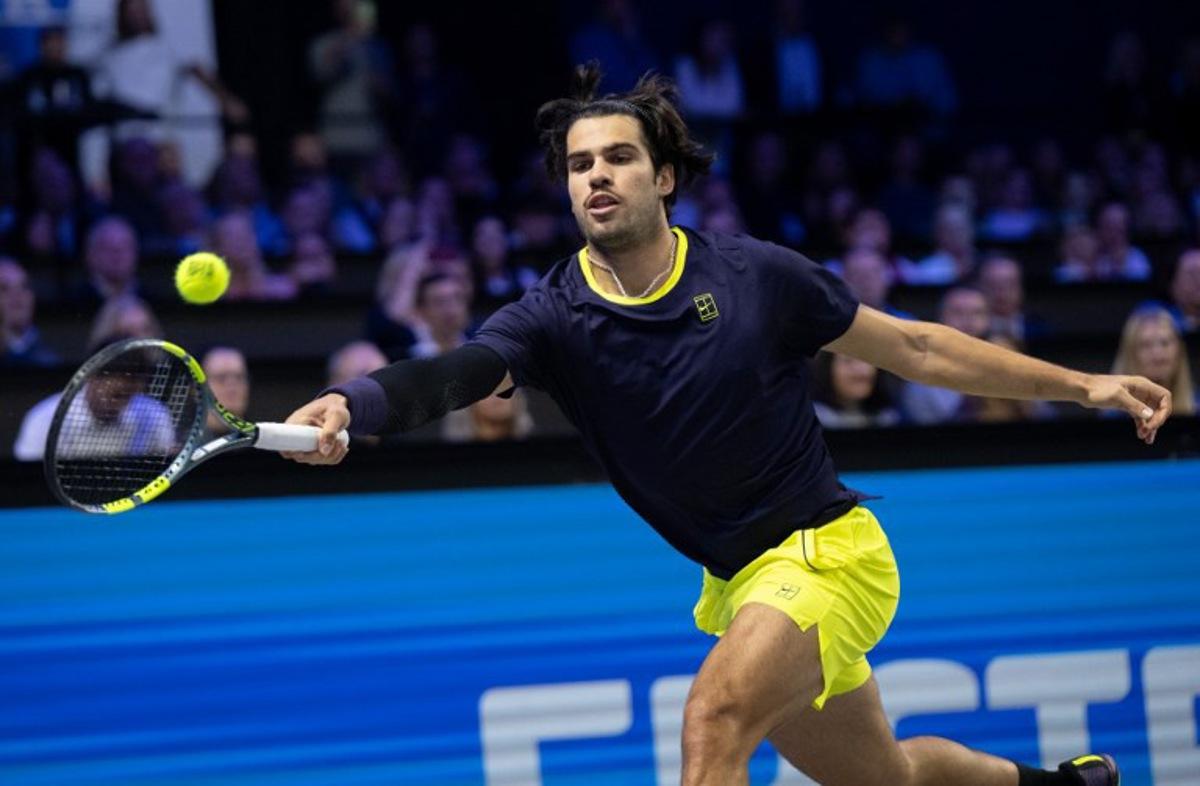 Spain's Carlos Alcaraz returns the ball to Russia's Daniil Medvedev (not pictured) during the semi-final match at the Erste Bank Open 2026 ATP 500 tennis tournament in Vienna, Austria, on October 31, 2026.  Joe Klamar / AFP