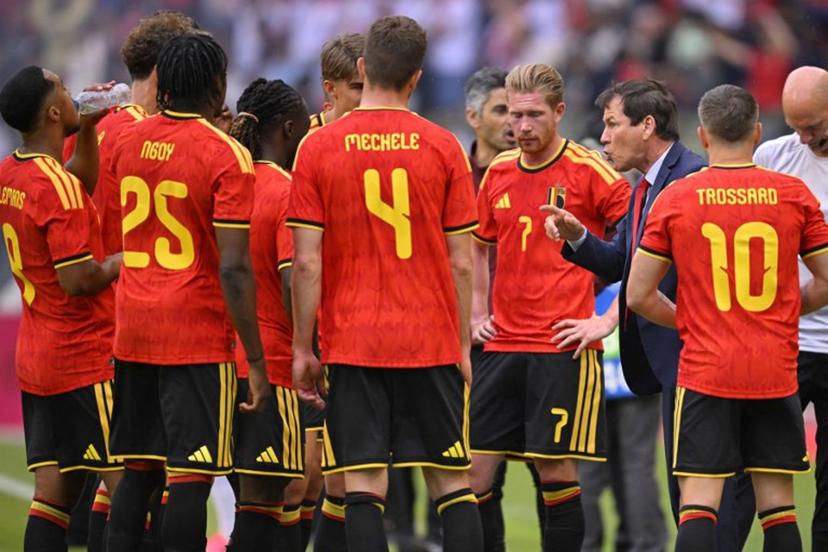 Belgium head coach Rudi Garcia (2ndR) speaks to his players during a cooling break in the international friendly football match between Belgium and Tunisia at the King Baudouin Stadium in Brussels on June 6, 2026.  JOHN THYS / AFP