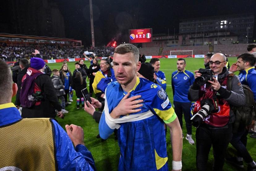 Bosnia-Herzegovina's forward #11 Edin Dzeko reacts after winning the FIFA World Cup 2026 European qualification final football match between Bosnia-Herzegovina and Italy at the Bilino-Polje stadium in Zenica on March 31, 2026.   Elvis BARUKCIC / AFP
