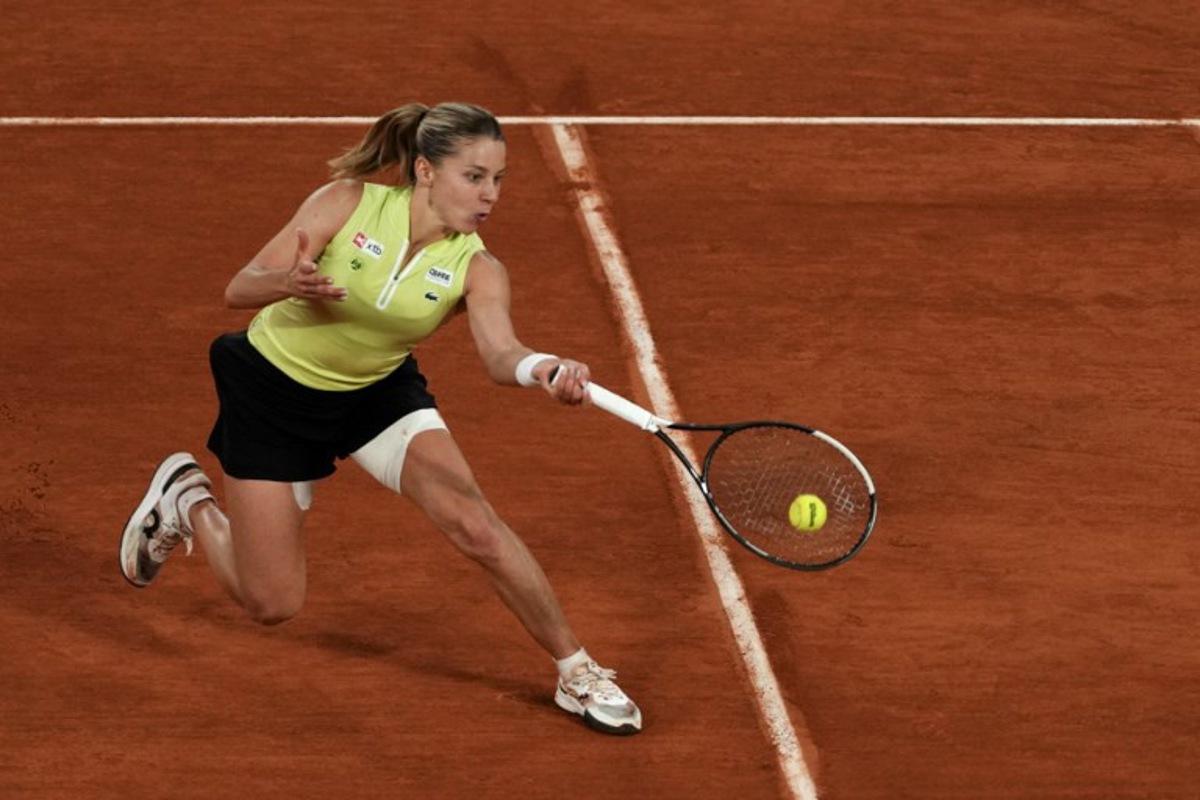 Poland's Maja Chwalinska plays a forehand return to Russia's Diana Shnaider during their women's semi final singles match on day 12 of the French Open tennis tournament on Court Philippe-Chatrier at the Roland-Garros Complex in Paris on June 4, 2026.  Dimitar DILKOFF / AFP