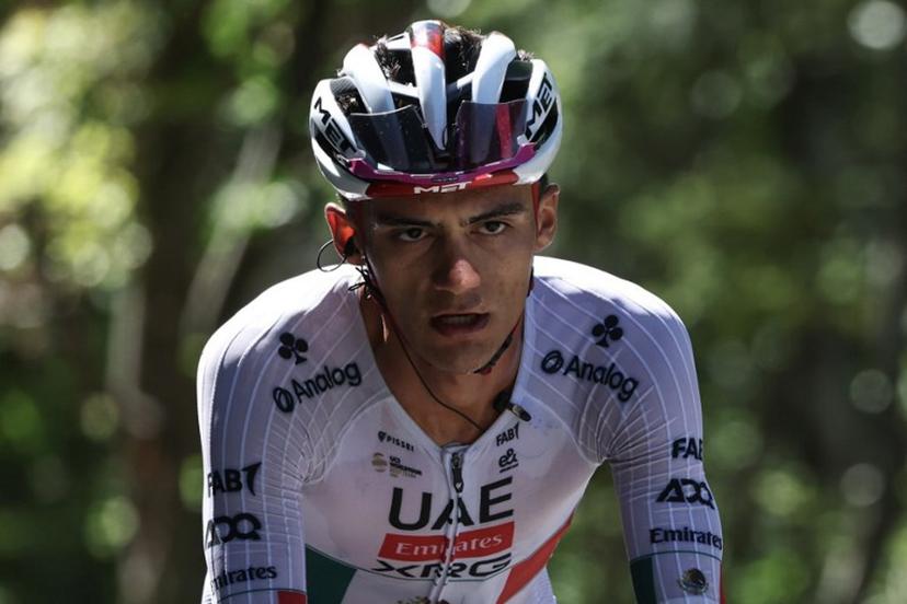 UAE Team Emirates XRG's Mexican rider Isaac Del Toro Romero cycles in a breakaway during the 8th and final stage of the Tour Auvergne-Rhone-Alpes cycling race (formerly known as the Criterium du Dauphine), 120,1km between Beaufort and Plateau de Solaison, in the French Alps on June 14, 2026.  Anne-Christine POUJOULAT / AFP