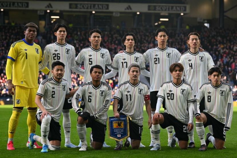 (Back row L-R) Japan's goalkeeper Zion Suzuk, Japan's forward Keisuke Goto, Japan's defender Tsuyoshi Watanabe, Japan's midfielder Ao Tanaka, Japan's defender Hiroki Ito and Japan's defender Ayumu Seko, (front row L-R) Japan's defender Yukinari Sugawara, Japan's midfielder Joel Chima Fujita, Japan's forward Daizen Maeda, Japan's midfielder Kodai Sano and Japan's midfielder Yuito Suzuki pose for a team photo ahead of the friendly International football match between Scotland and Japan at Hampden Park, in Glasgow, on March 28, 2026.  ANDY BUCHANAN / AFP