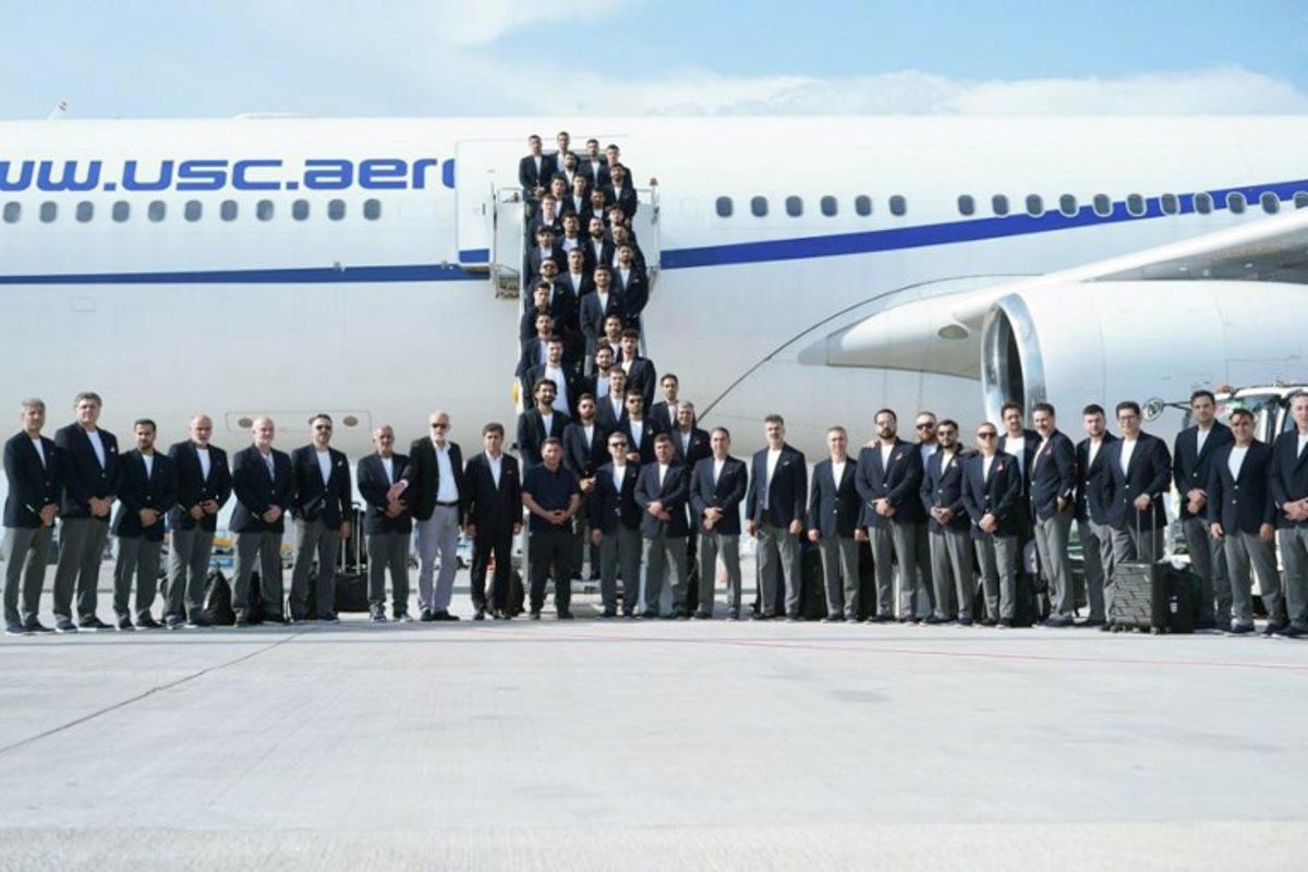 This handout photograph taken and released by Iran Football Federation Press Office on June 6, 2026 shows Iran's national team players posing at Antalya Airport before boarding a plane ahead of their departure to Mexico for the FIFA 2026 World Cup football tournament, in Antalya, Turkey, on June 6, 2026. Iran lashed out at the United States on June 6 for refusing visas to some of its World Cup squad support staff as the players were to leave Turkey for Mexico. Handout / Iran football Federation Press office / AFP