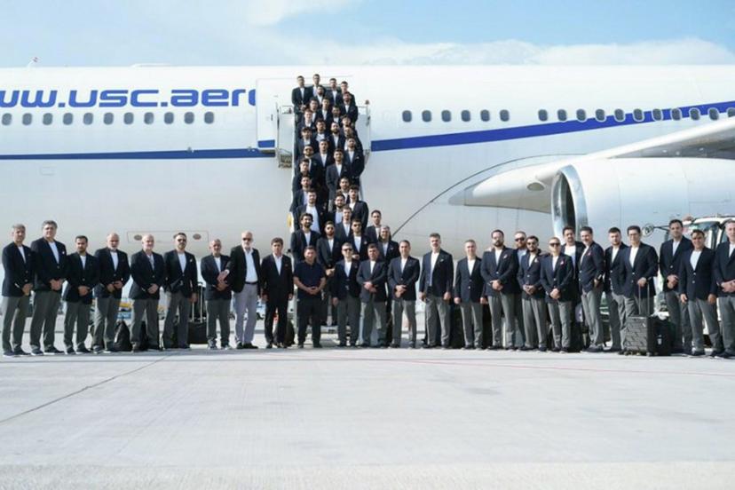This handout photograph taken and released by Iran Football Federation Press Office on June 6, 2026 shows Iran's national team players posing at Antalya Airport before boarding a plane ahead of their departure to Mexico for the FIFA 2026 World Cup football tournament, in Antalya, Turkey, on June 6, 2026. Iran lashed out at the United States on June 6 for refusing visas to some of its World Cup squad support staff as the players were to leave Turkey for Mexico. Handout / Iran football Federation Press office / AFP