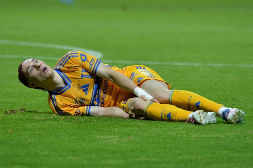 Tigres' midfielder #20 Marcelo Flores reacts in pain during the CONCACAF Champions Cup final football match between Mexico's Toluca and Tigres UANL at the Nemesio Diez Stadium in Toluca, Mexico on May 30, 2026.  Mario Vazquez / AFP