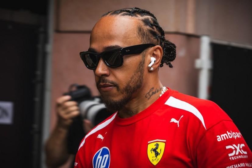 Ferrari's British driver Lewis Hamilton walks down the paddock at the Circuit de Monaco in Monaco, on June 4, 2026, ahead of the Formula One Monaco Grand Prix.  Andrej ISAKOVIC / AFP