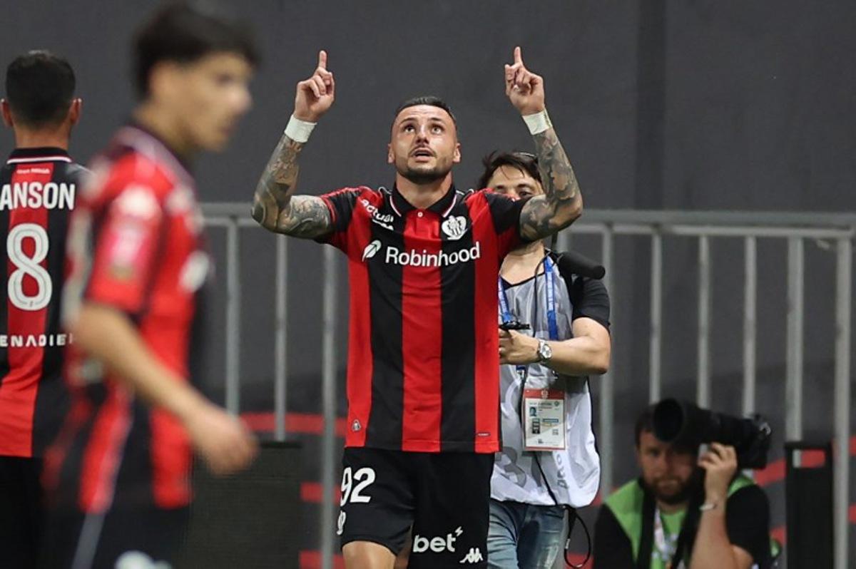 Nice's French defender #92 Jonathan Clauss celebrates after scoring a first goalduring the L1-L2 playoff second-leg football match between first divison club OGC Nice and second division club AS Saint-Etienne at the Allianz Riviera Stadium in Nice, south-eastern France, on May 29, 2026.  Valery HACHE / AFP