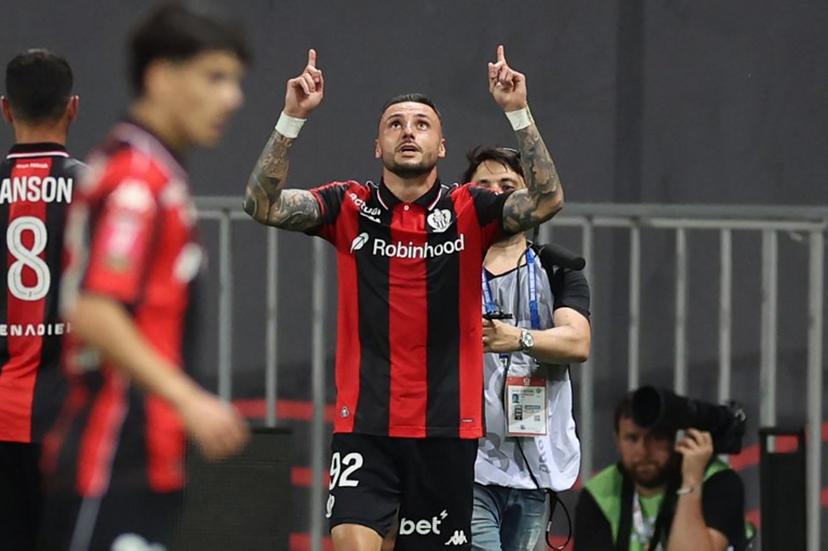 Nice's French defender #92 Jonathan Clauss celebrates after scoring a first goalduring the L1-L2 playoff second-leg football match between first divison club OGC Nice and second division club AS Saint-Etienne at the Allianz Riviera Stadium in Nice, south-eastern France, on May 29, 2026.  Valery HACHE / AFP