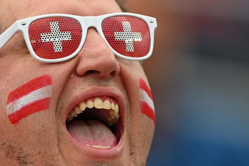 A Swiss fan cheers for his team ahead of the 2026 World Cup Group B football match between Switzerland and Bosnia and Herzegovina at Los Angeles Stadium in Inglewood on June 18, 2026.   Patrick T. Fallon / AFP