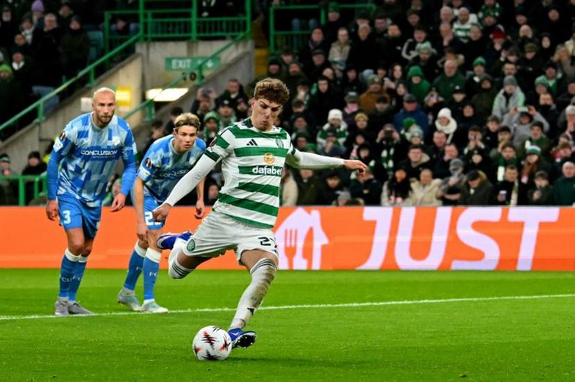 Celtic's Belgian midfielder #27 Arne Engels scores the team's third goal from the penalty spot during the UEFA Europa League league-stage football match between Celtic and FC Utrecht at Celtic Park in Glasgow on January 29, 2026.  ANDY BUCHANAN / AFP
