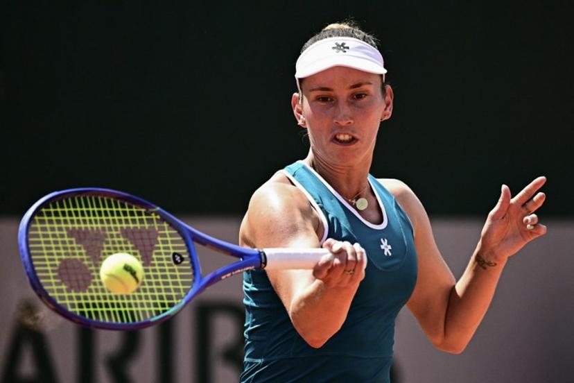 Belgium's Elise Mertens plays a forehand return to Poland's Maja Chwalinska during their women's singles match on day 5 of the French Open tennis tournament at the Roland-Garros Complex in Paris on May 28, 2026.  JULIEN DE ROSA / AFP