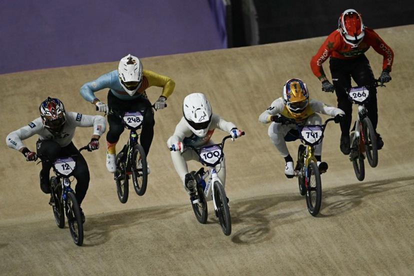 (From L) US' #12 Cameron Wood, Belgium's #248 Ruben Gommers, France's #100 Romain Mahieu, Colombia's #741 Diego Alejandro Arboleda Ospina and Morocco's #266 Dean Reeves compete in first heat of the third run of the Men's Cycling BMX Racing quarterfinals during the Paris 2024 Olympic Games in Saint-Quentin-en-Yvelines, on August 1, 2024.  Mauro PIMENTEL / AFP