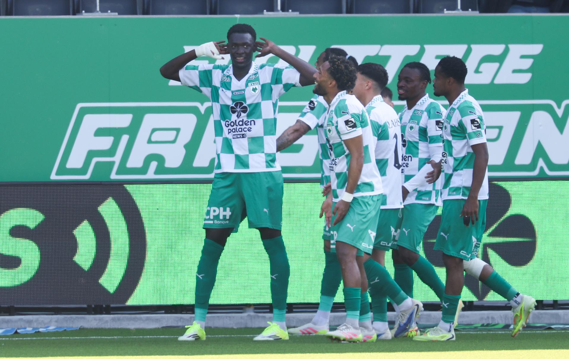 RAAL's Pape Fall celebrates after scoring during a soccer match between RAAL La Louviere and Cercle Brugge, Saturday 09 May 2026 in La Louviere, on the sixth and last day of the Relegation Play-offs phase of the 2025-2026 'Jupiler Pro League' first division of the Belgian championship. BELGA PHOTO VIRGINIE LEFOUR