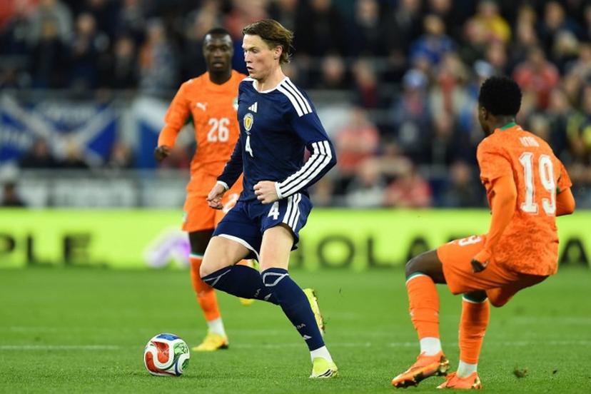 Scotland's midfielder #04 Scott McTominay (C) runs with the ball during the friendly international football match between Scotland and Ivory Coast at the Hill Dickinson Stadium in Liverpool, north west England on March 31, 2026.    PETER POWELL / AFP