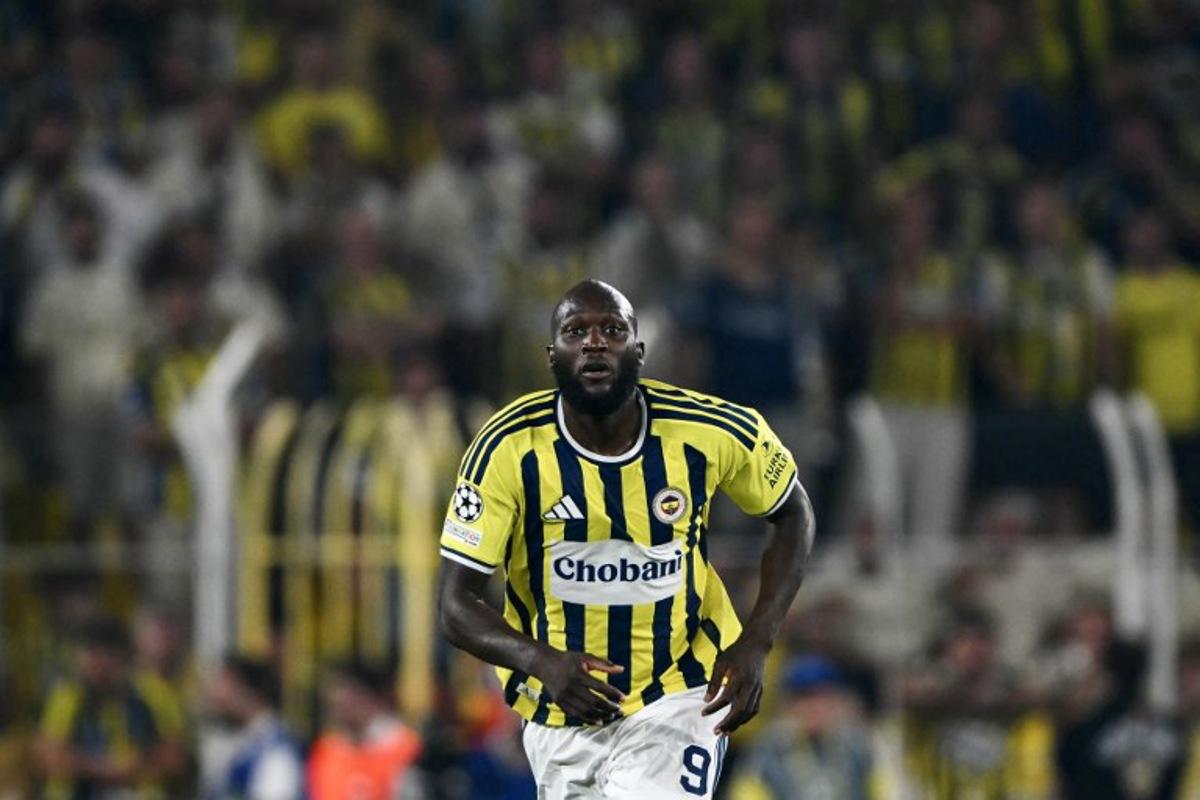 Fenerbahce's Belgian forward #09 Romelu Lukaku reacts during the UEFA Champions League qualifying playoff - first leg football match between Fenerbahce SK and Olympique Lyonnais (OL) at the Sukru Saracoglu Stadium in Istanbul on August 18, 2026.  YASIN AKGUL / AFP