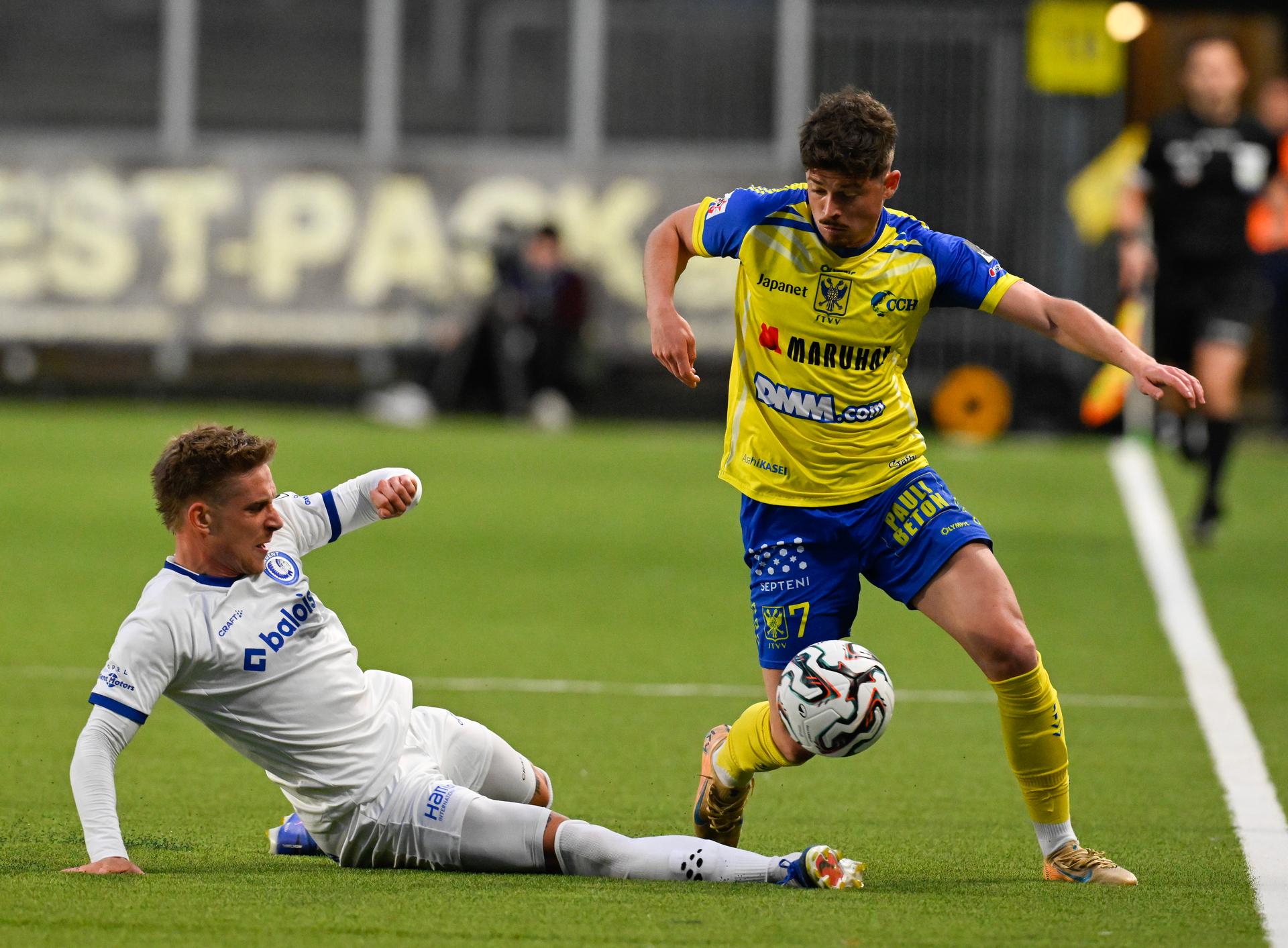 Gent's Michal Skoras and STVV's Arbnor Muja fight for the ball during a soccer match between Sint-Truiden VV and KAA Gent, Saturday 16 May 2026 in Sint-Truiden, on the eight day of the Champion's Play-offs of the 2025-2026 'Jupiler Pro League' first division of the Belgian championship. BELGA PHOTO JOHN THYS