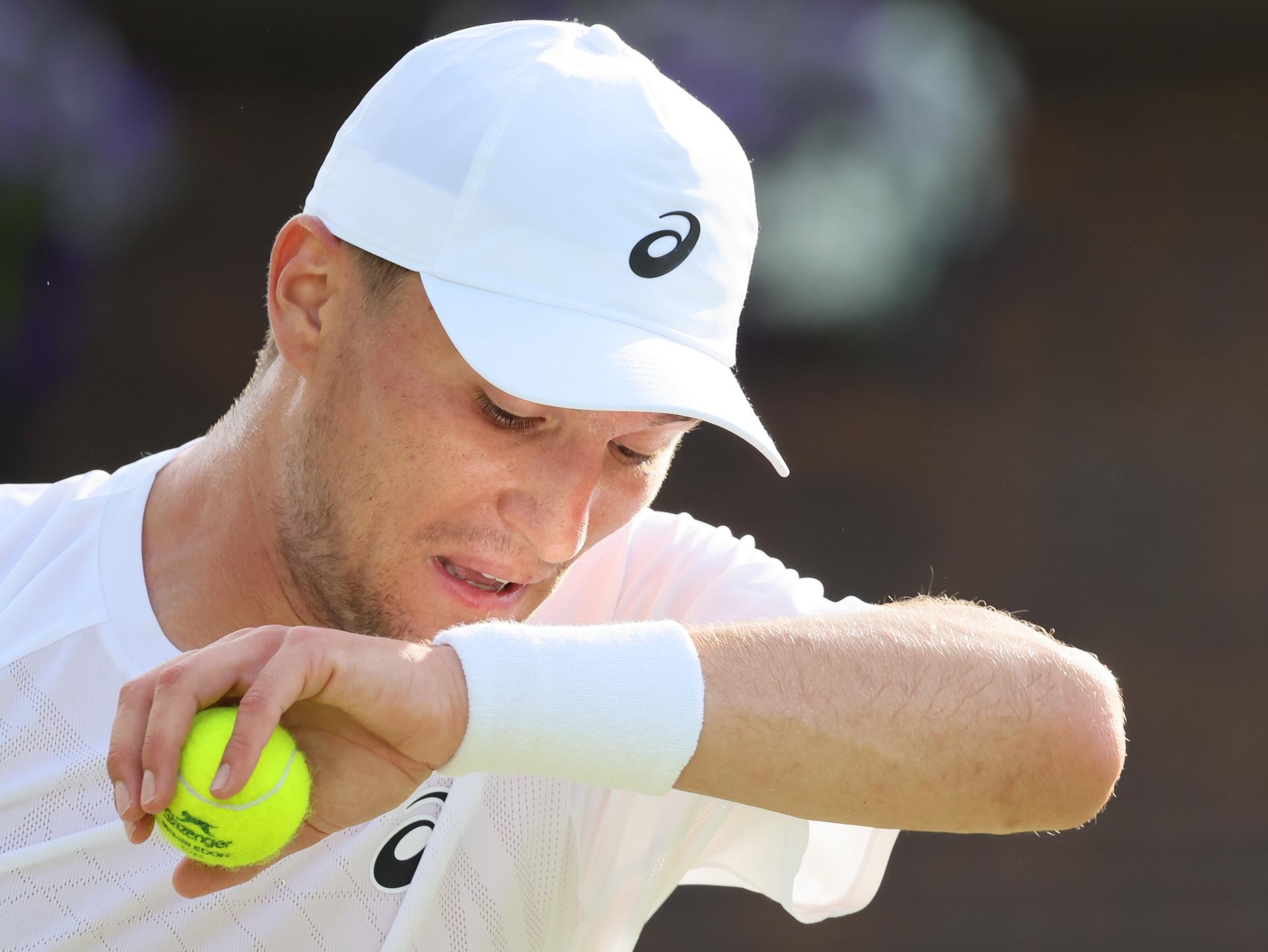 Belgian Raphael Collignon pictured in action at a tennis game against Croatian Cilic, in the first round of the men's singles at the 2025 Wimbledon grand slam tournament, Tuesday 01 July 2025 at the All England Tennis Club, in South-West London, Britain. BELGA PHOTO BENOIT DOPPAGNE