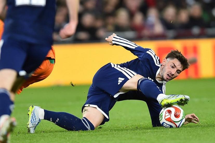 Scotland's midfielder #08 Billy Gilmour controls the ball during the friendly international football match between Scotland and Ivory Coast at the Hill Dickinson Stadium in Liverpool, north west England on March 31, 2026.    PETER POWELL / AFP