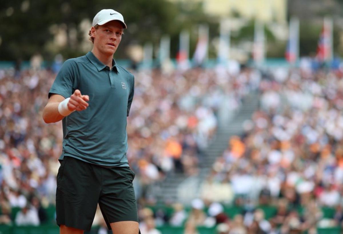 Italy's Jannik Sinner gestures as he plays against France's Ugo Humbert during the Monte Carlo ATP Masters Series Tournament round of 64 tennis match on Court Rainier III at the Monte-Carlo Country Club in Roquebrune-Cap-Martin, south-eastern France on April 7, 2026.  Valery HACHE / AFP